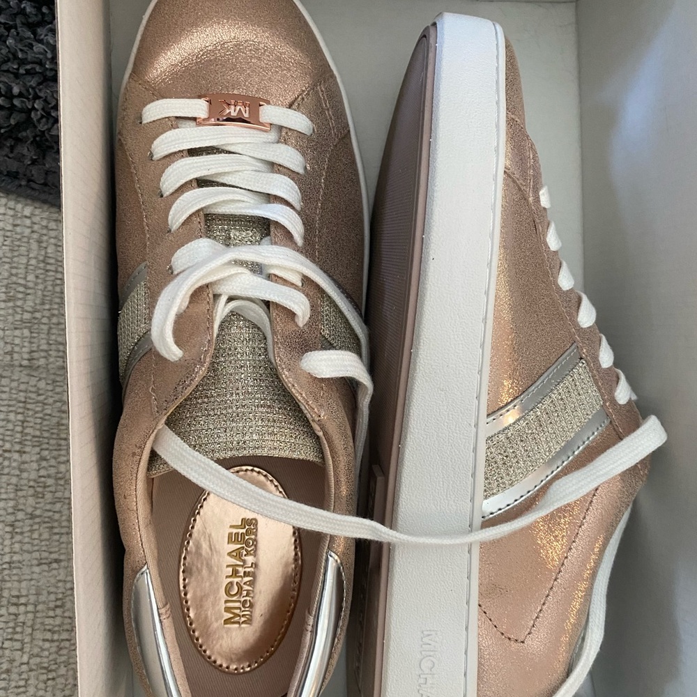 Michael Kors women's size 9.5 rose gold sneaker slightly worn